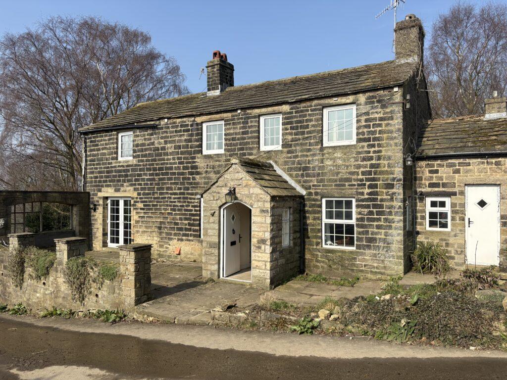 Main image of property: 3 Bedroom Farmhouse for Sale – Belle Vue Farm, Peasacre, Bingley, BD16 3JR