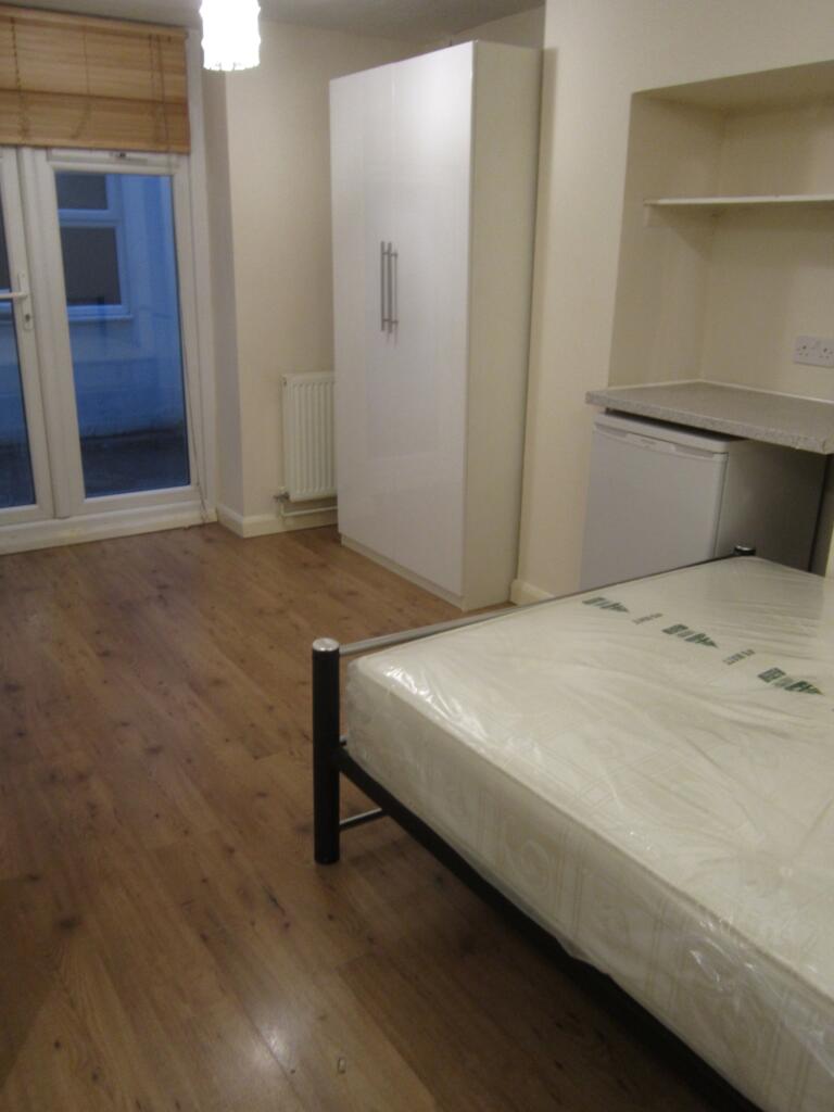 Main image of property: 9A Russell Gardens, London, W14