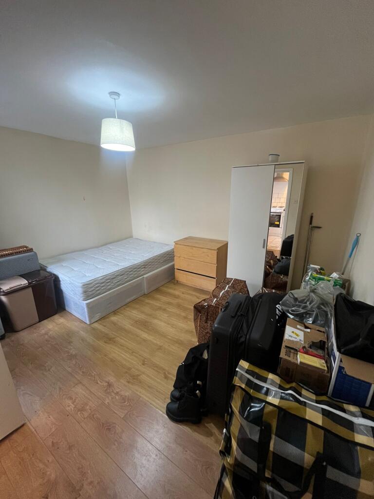 Main image of property: 2 Wolverton Gardens, London, W6