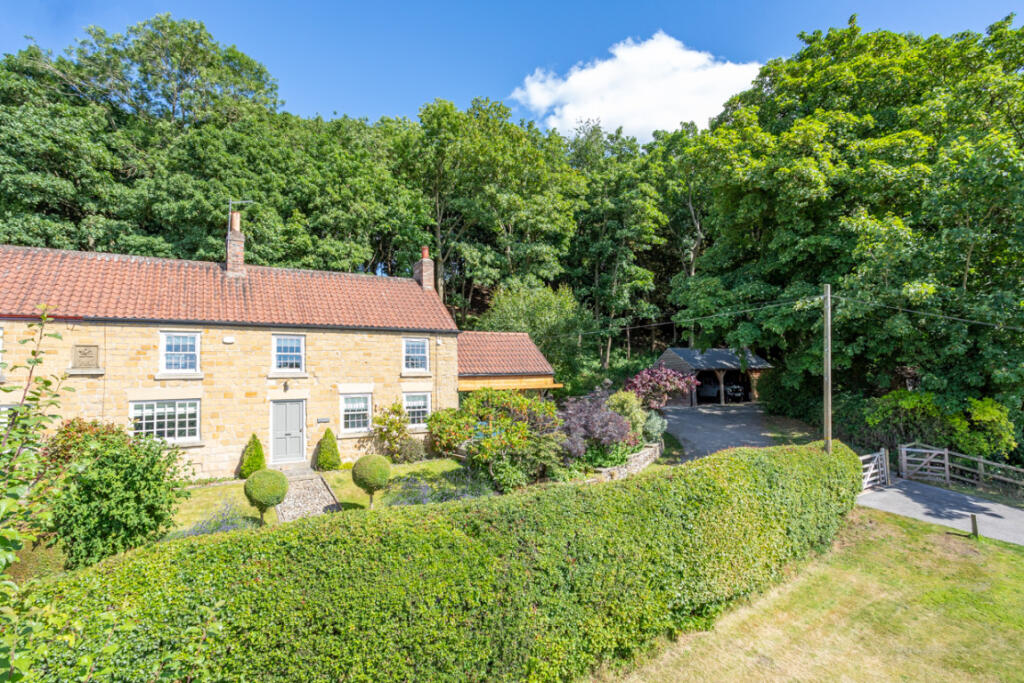 Main image of property: 2, Woodside, Brandsby, York YO61 4RE