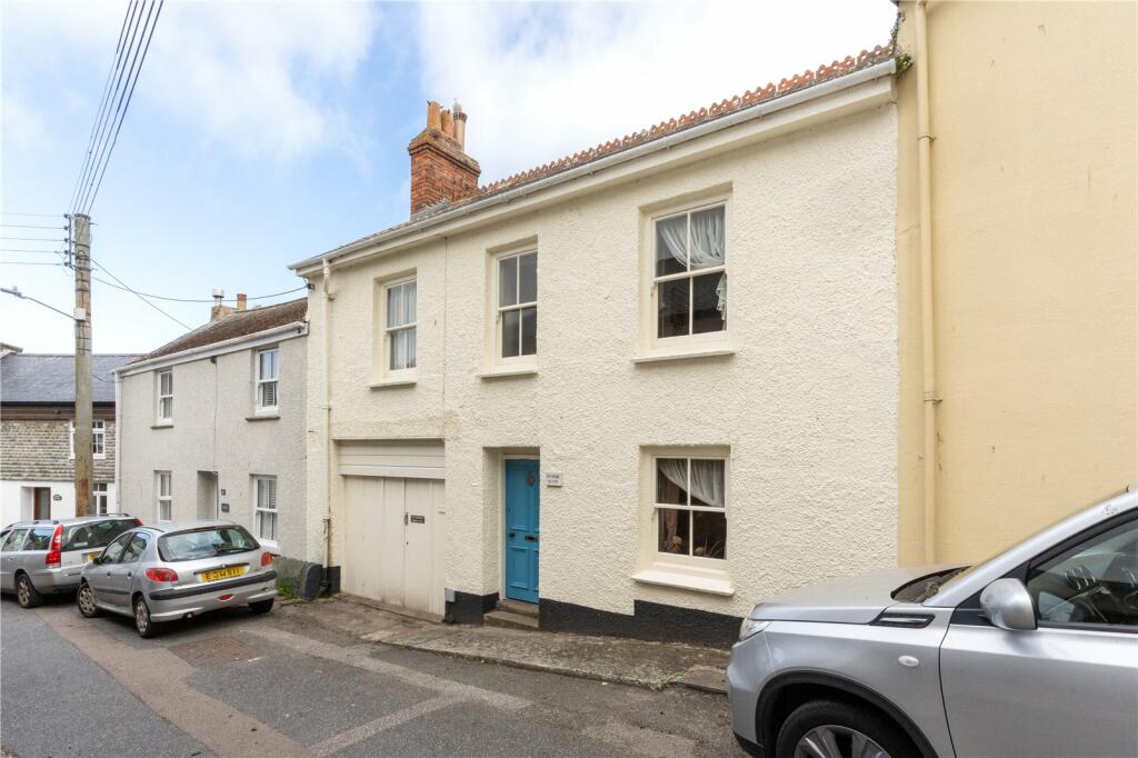 3 bedroom terraced house in Newlyn with outbuildings possible studio and incredible gardens.
