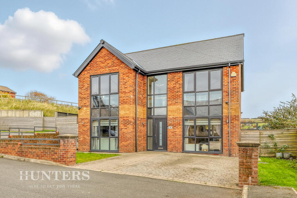 Main image of property: Moordale Avenue, Oldham