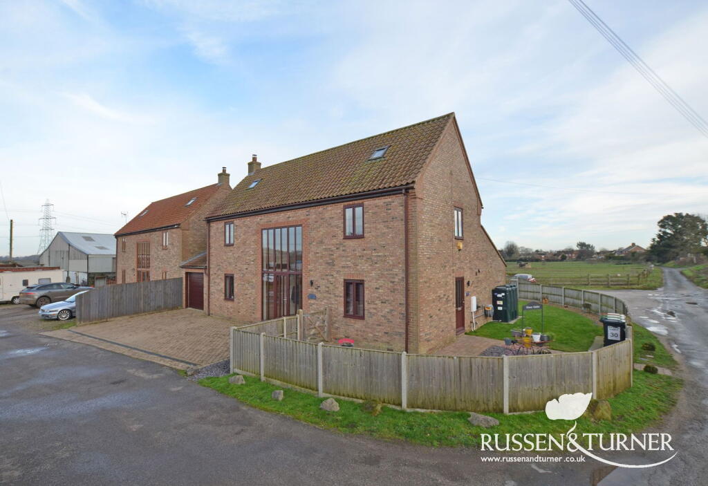 Main image of property: A Stunning, Modern Barn-Style Home in Pentney