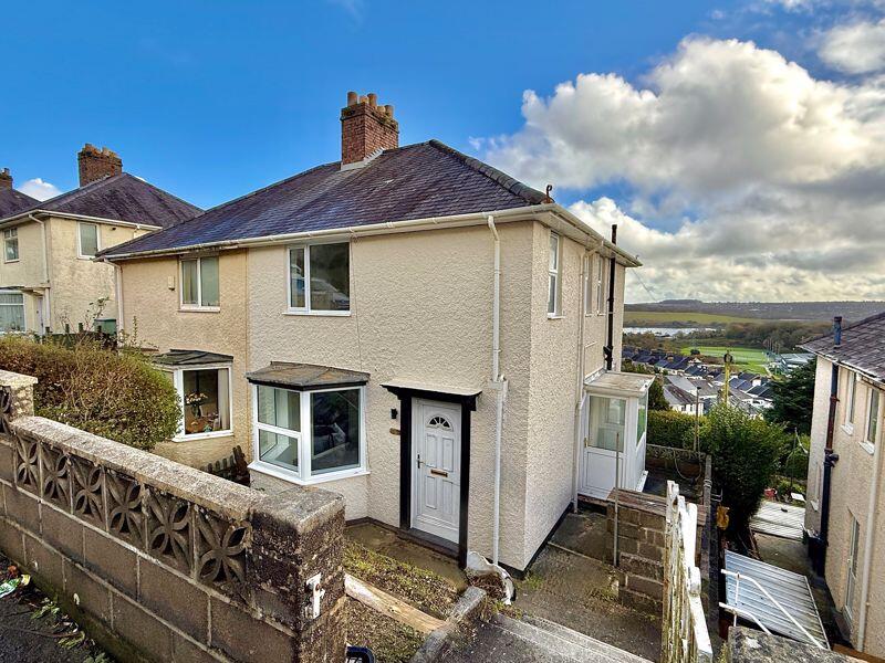 Main image of property: Efford Lane, Efford, Plymouth. Stylishly Refurbished 3-Bedroom Family semi detached Home with Estuary Views
