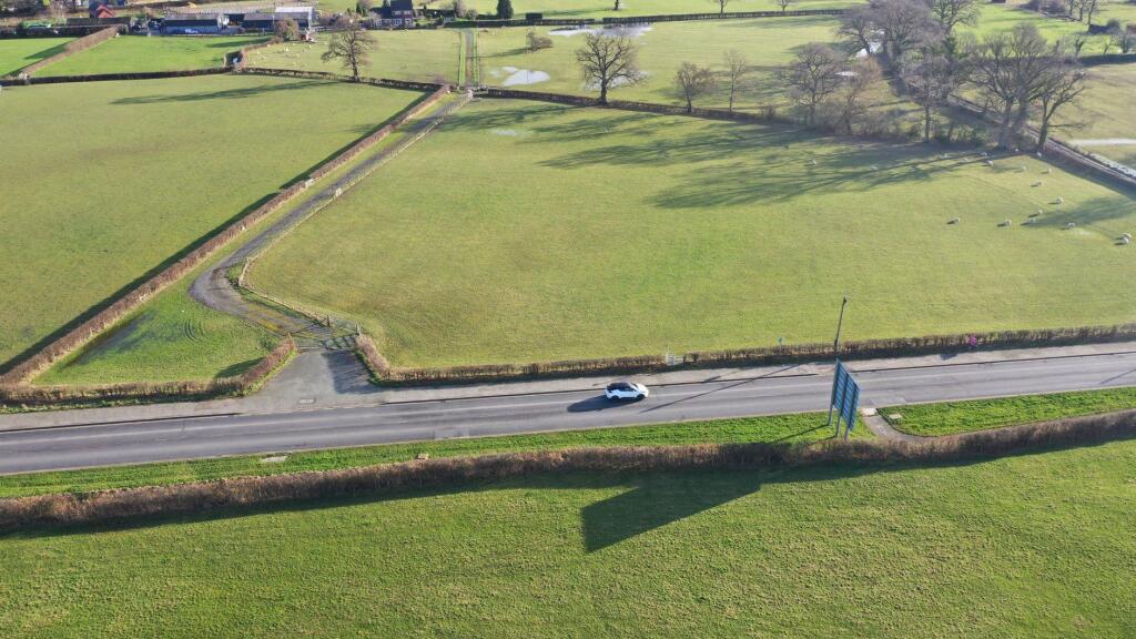 Main image of property: Land fronting the A483, Four Crosses, Llanymynech, SY22 6RF