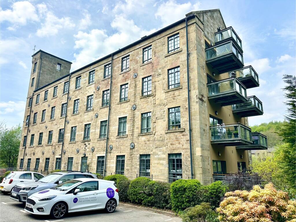 Main image of property: Woodhouse Mill, Woodhouse Road, Todmorden, OL14 5LF