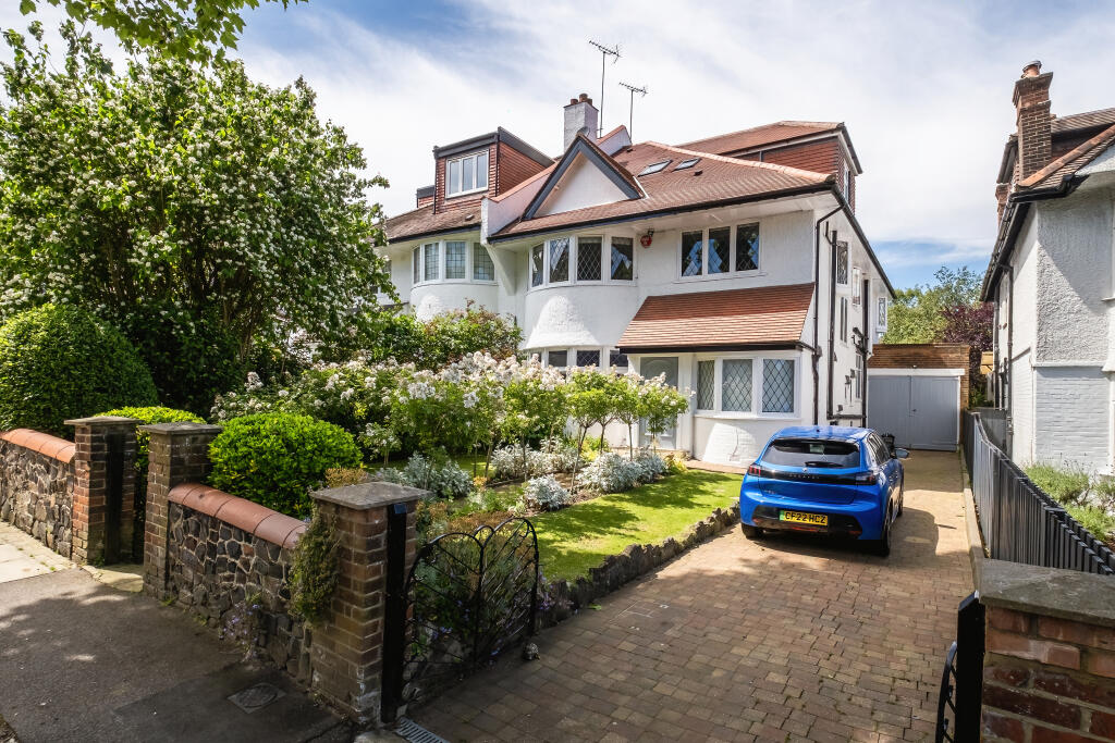 Main image of property: Woodside Avenue, LONDON, N6
