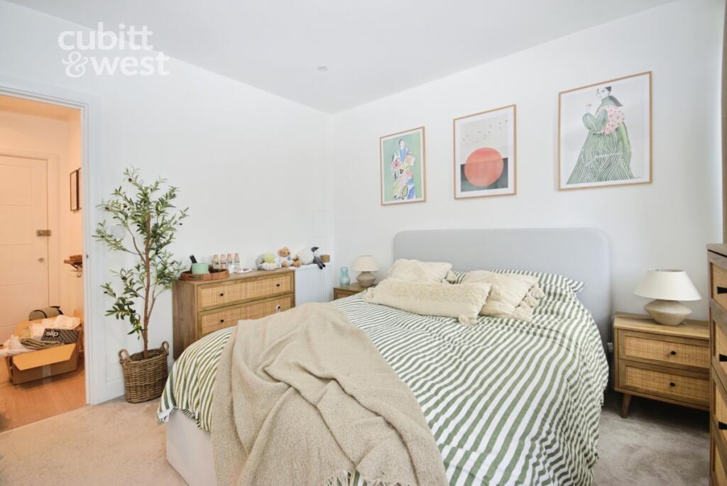 Main image of property: Bay Tree Avenue KT22