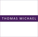 Thomas Michael logo