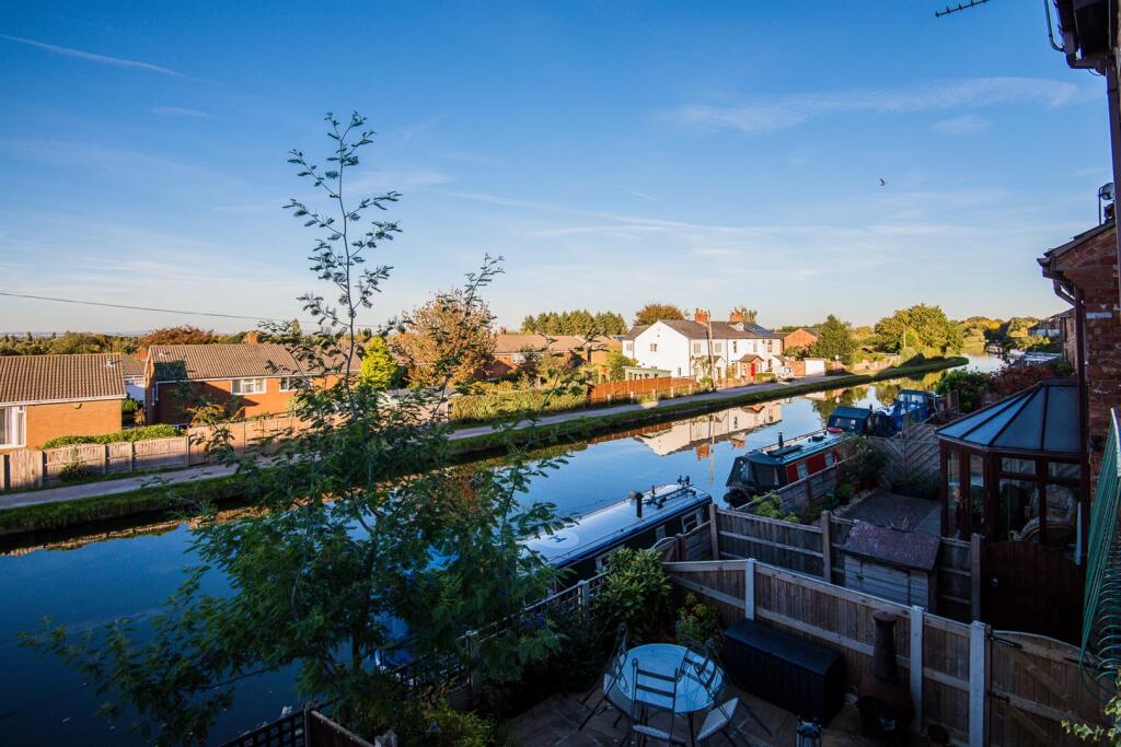 Main image of property: Quayside Mews, Lymm