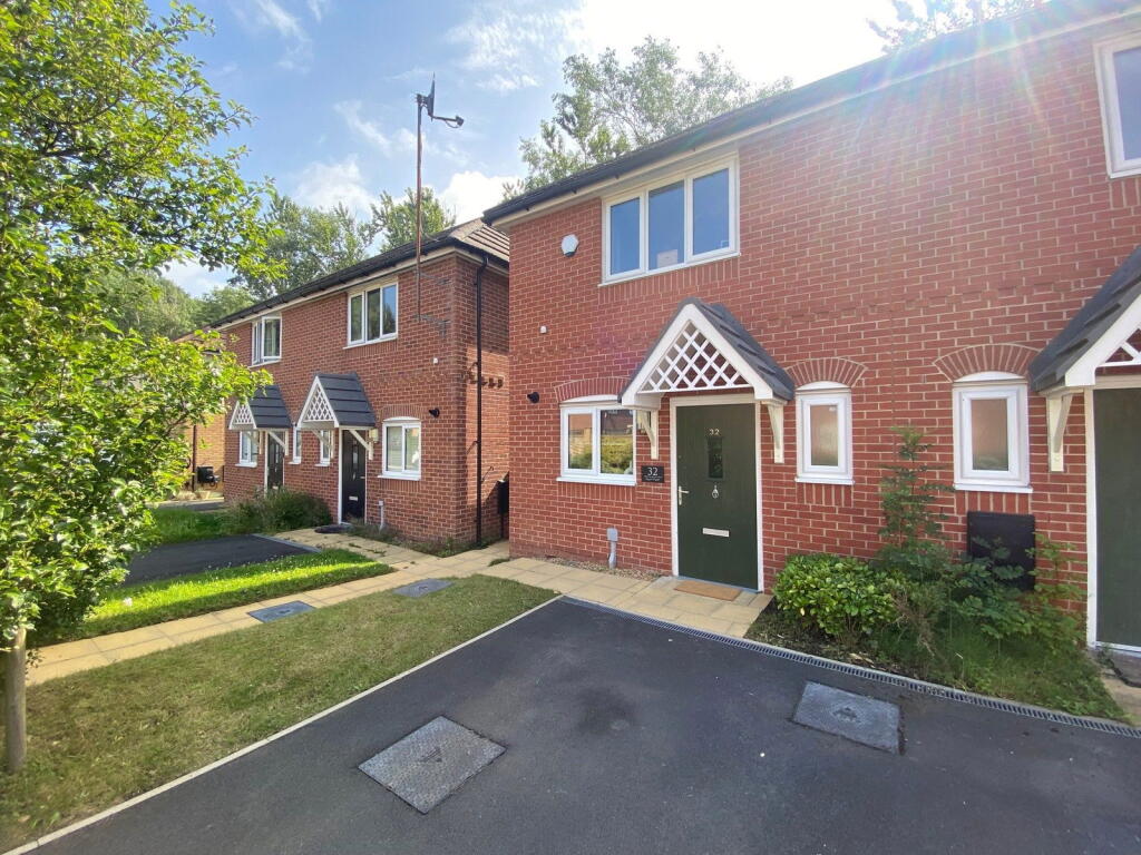 Main image of property: 32 Walter Mills Way, Oldham, OL4 3FU