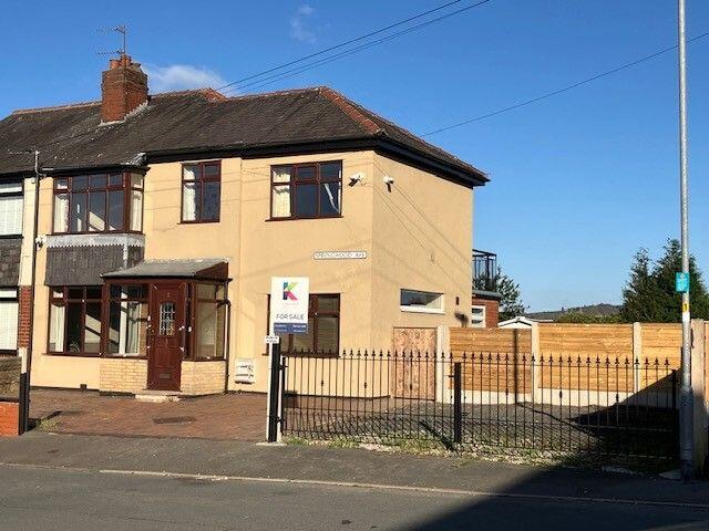 Main image of property: 2 Springwood Avenue, Chadderton OL9 9RR