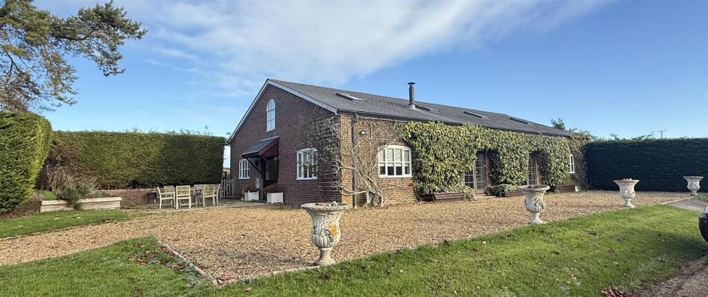 Main image of property: Hunton Lodge