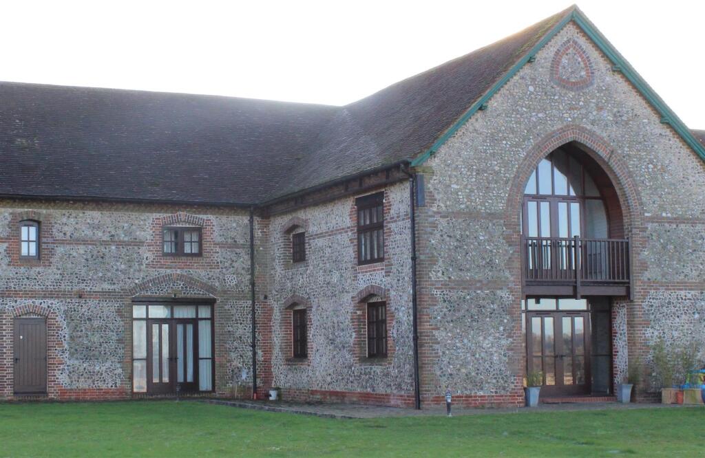 Main image of property: 12 Basing Barns