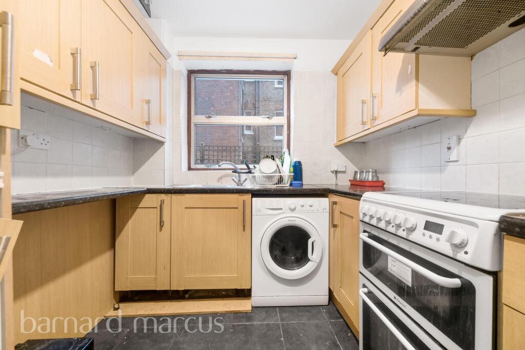 Main image of property: 52 Parkgate Road, London