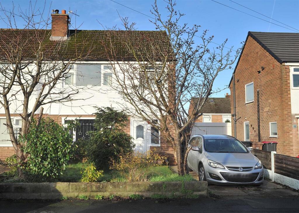 Main image of property: 18 Exeter Drive, Irlam M44 6FH