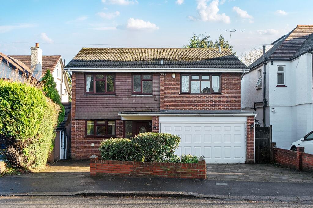 Main image of property: Woodcote Grove Road, Coulsdon, CR5