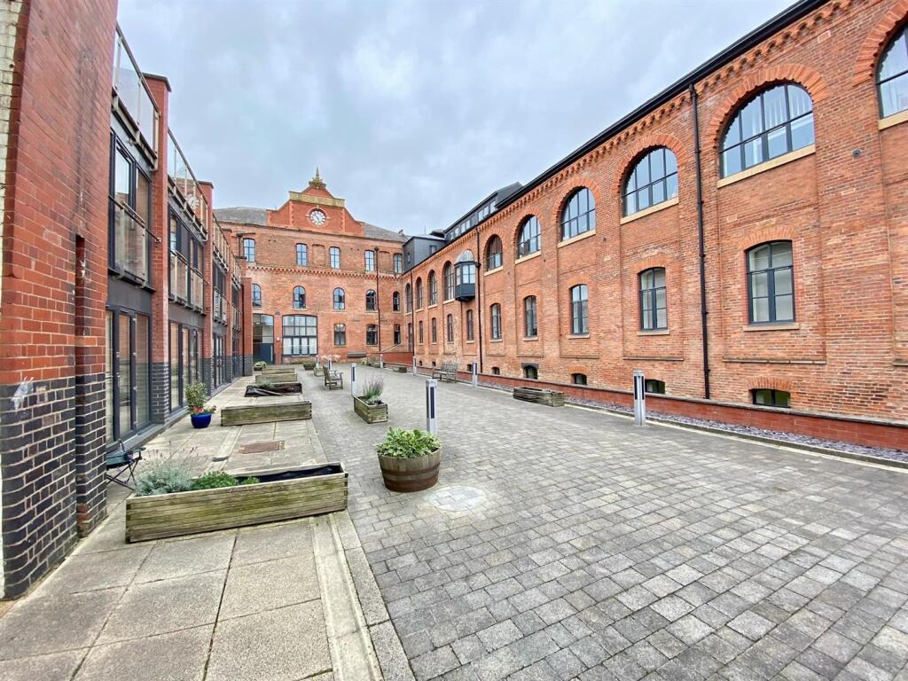 Main image of property: Queens Brewery Court, Moss Lane West, Manchester
