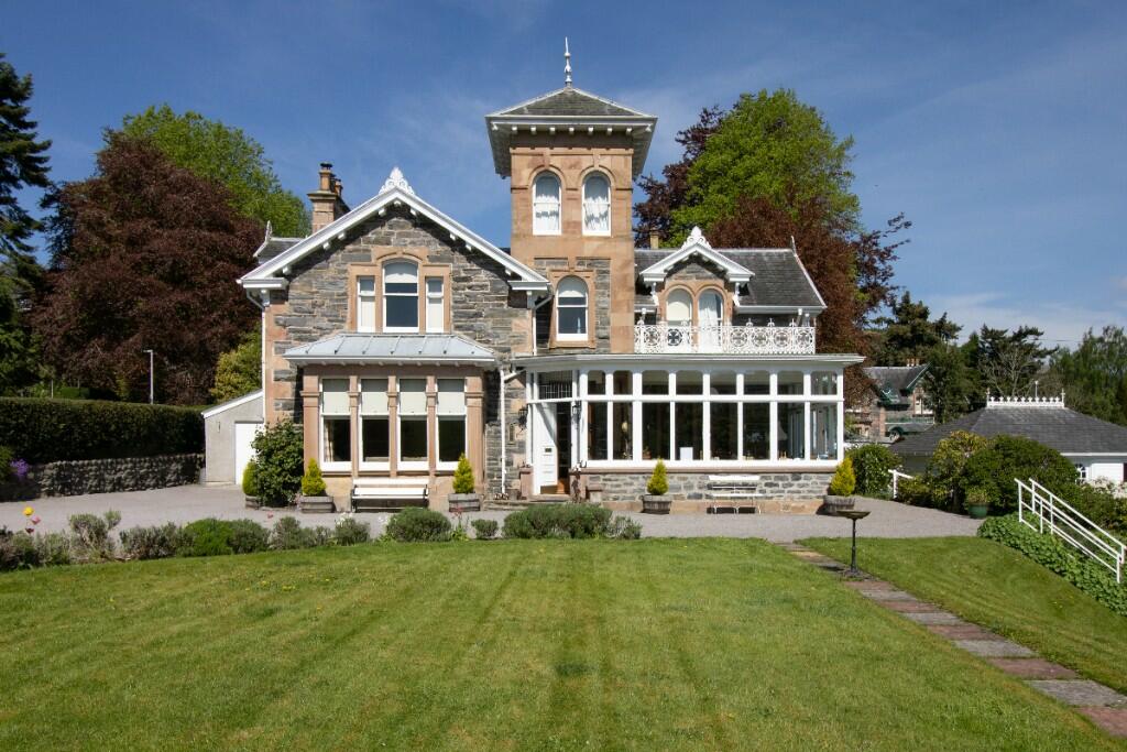 Main image of property: Holly Lodge and Cottage, Strathpeffer, Ross-Shire, IV14 9AR