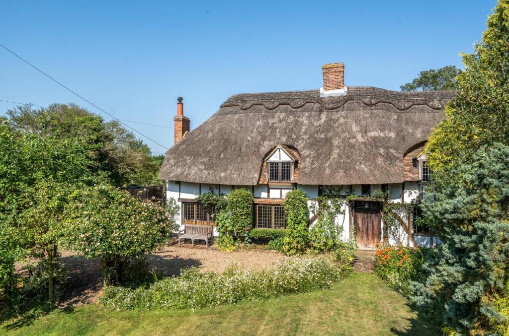 Main image of property: Beautiful Thatched Home - Doddington