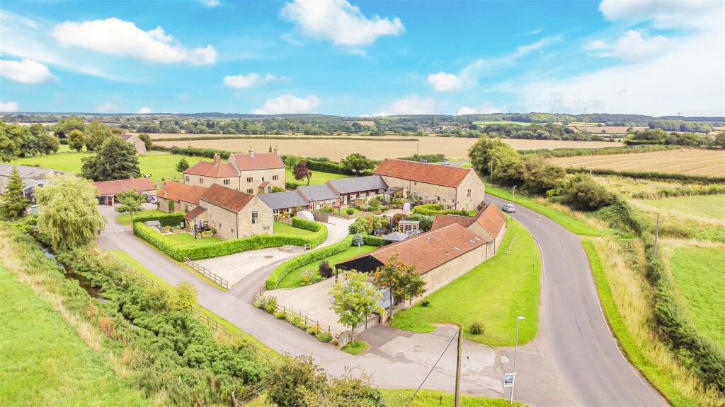 Main image of property: Discover a home full of character at Lodge Barn