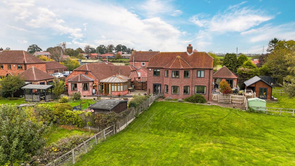 Main image of property: Rare multigenerational living option in the quiet village of East Stoke
