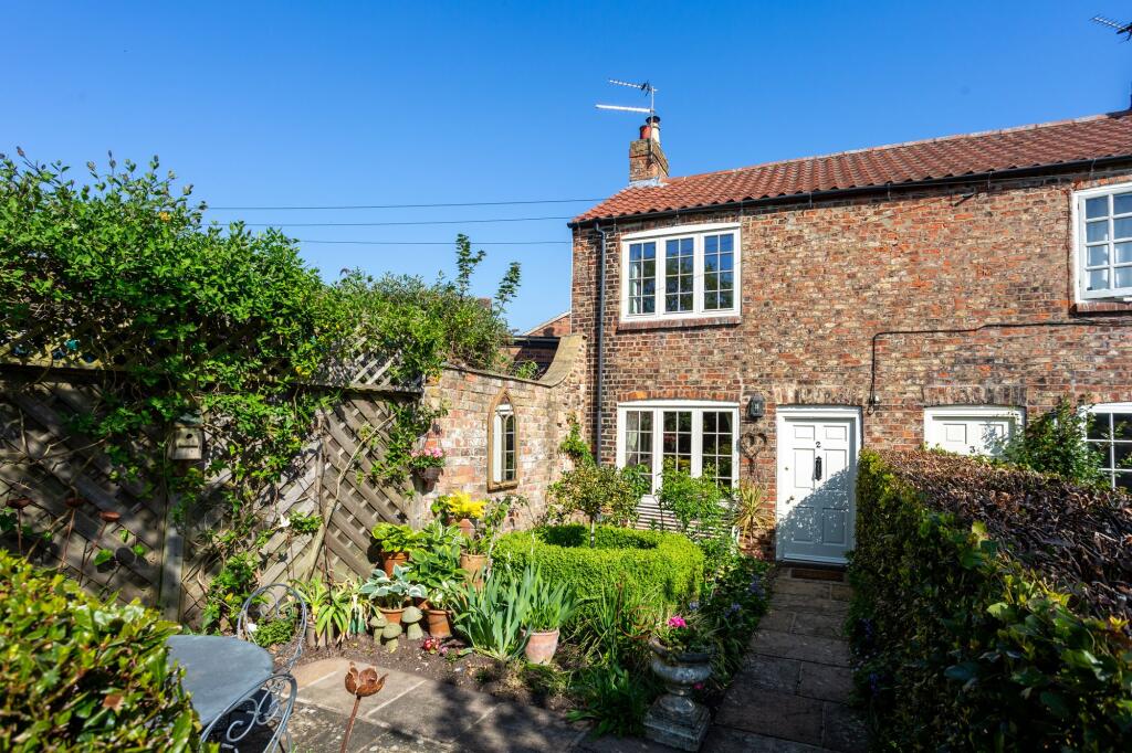Main image of property: Holly Cottage, 2 Church Street, Copmanthorpe, YO23