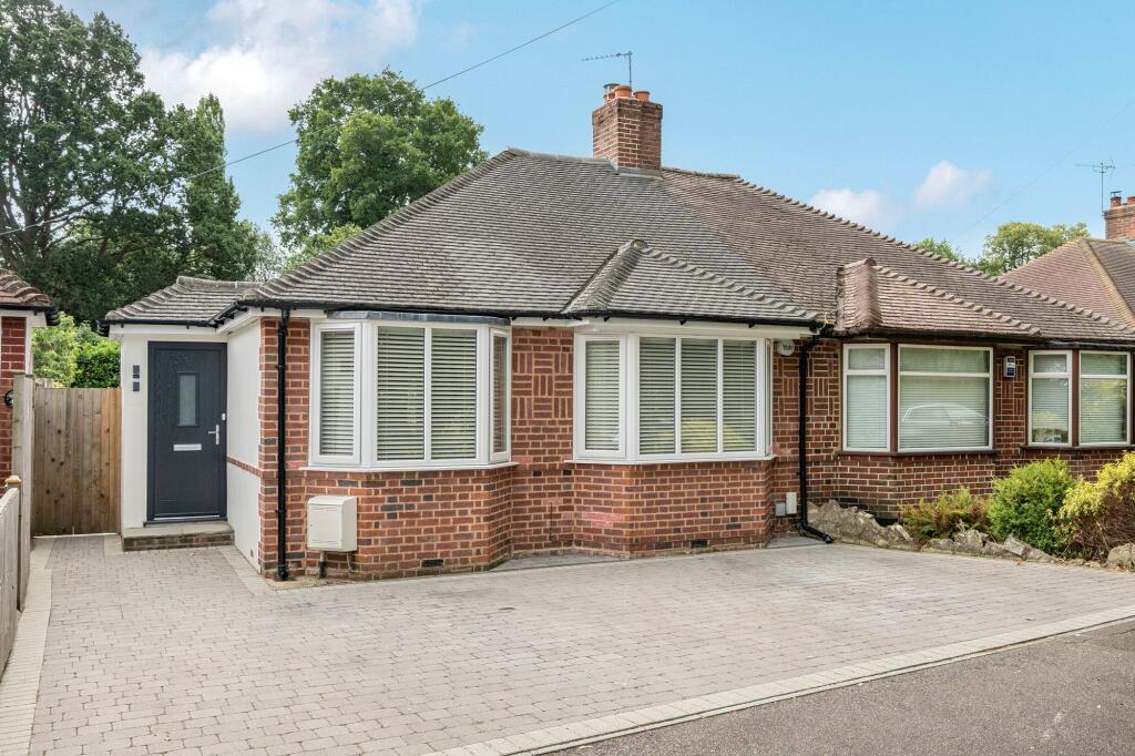 Main image of property: Lane End, Epsom, KT18