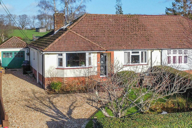 Main image of property: Woodlands