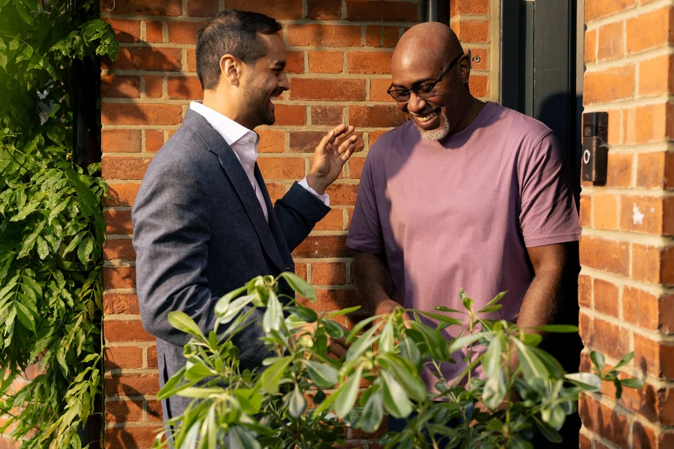 Gentlemen chatting at porch