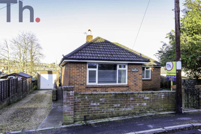 Front Elevation with driveway & garage