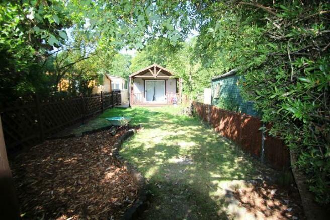 Rear garden and outbuilding