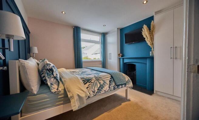 BEDROOM ONE TO FRONT