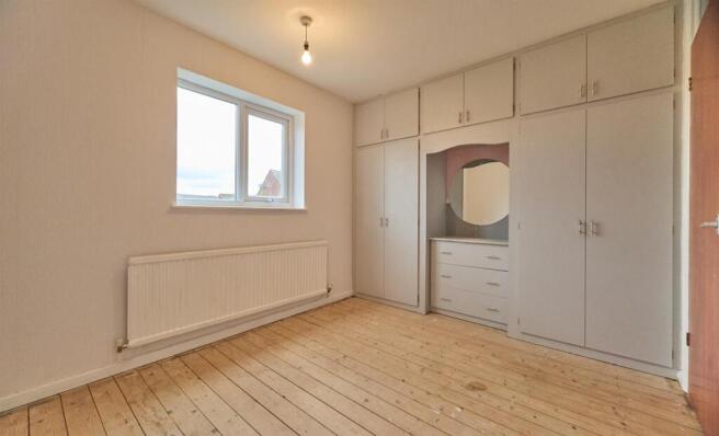 BEDROOM ONE TO REAR