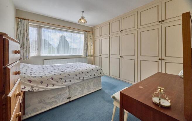 BEDROOM ONE TO FRONT