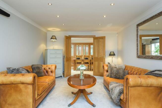 SITTING ROOM DINING AREA AND KITCHEN