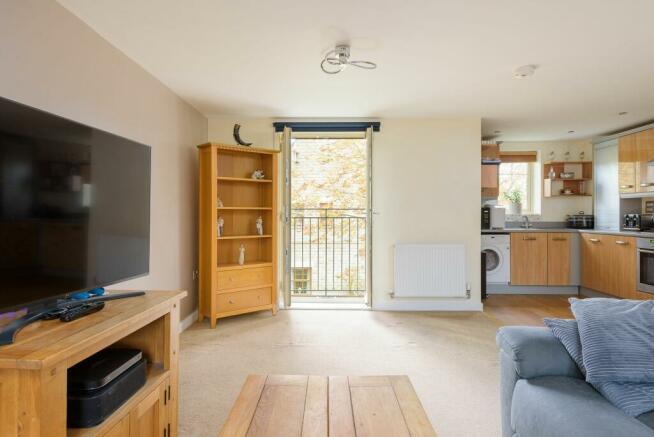 SITTING ROOM AND KITCHEN