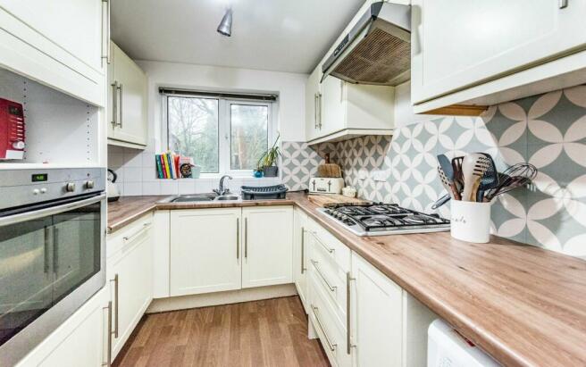 SITTING ROOM AND KITCHEN