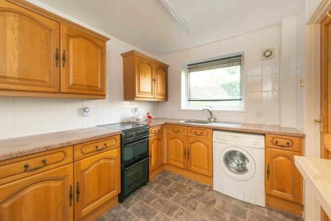 SITTING ROOM AND KITCHEN