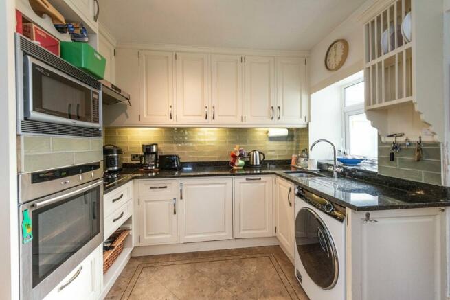 SITTING ROOM KITCHEN AND CONSERVATORY