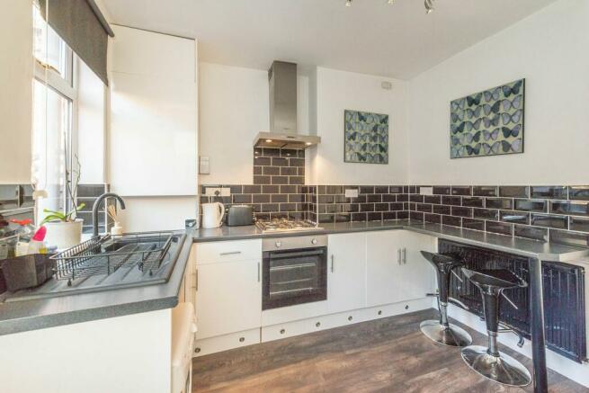 SITTING ROOM AND FITTED KITCHEN