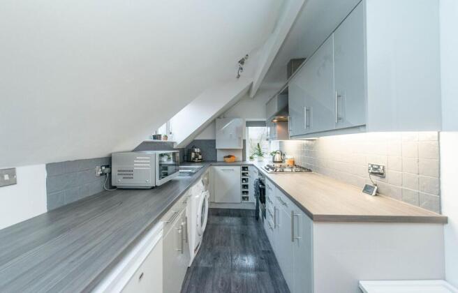 SITTING ROOM AND KITCHEN