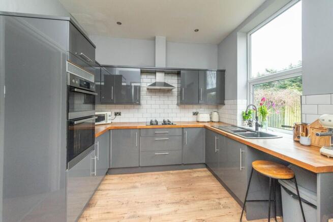 SITTING ROOM AND DINING KITCHEN