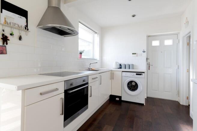 KITCHEN, LIVING ROOM AND CONSERVATORY
