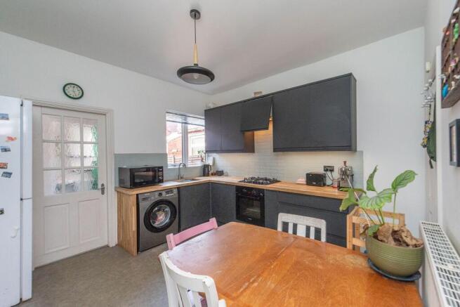 SITTING ROOM AND BEAUTIFUL DINING KITCHEN