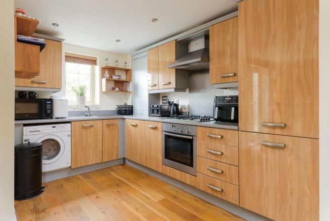 SITTING ROOM AND KITCHEN