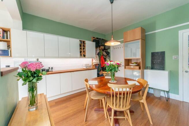 SITTING ROOM AND OPEN PLAN DINING KITCHEN