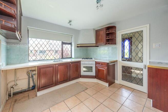 SITTING ROOM DINING KITCHEN AND SUN ROOM