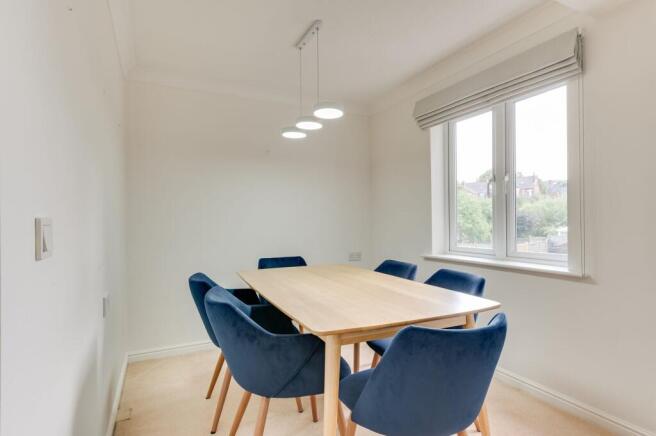 LARGER THAN AVERAGE SITTING AND DINING ROOM