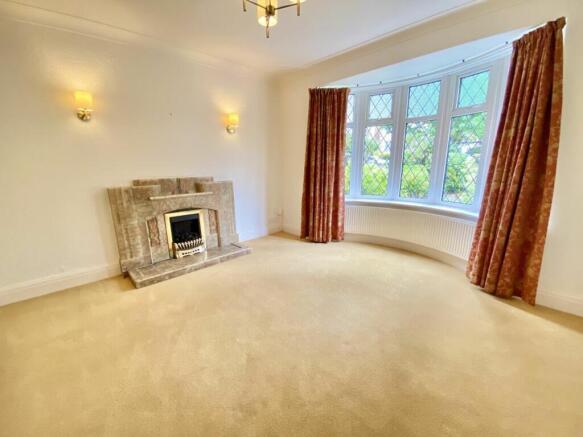 SITTING ROOM AND KITCHEN
